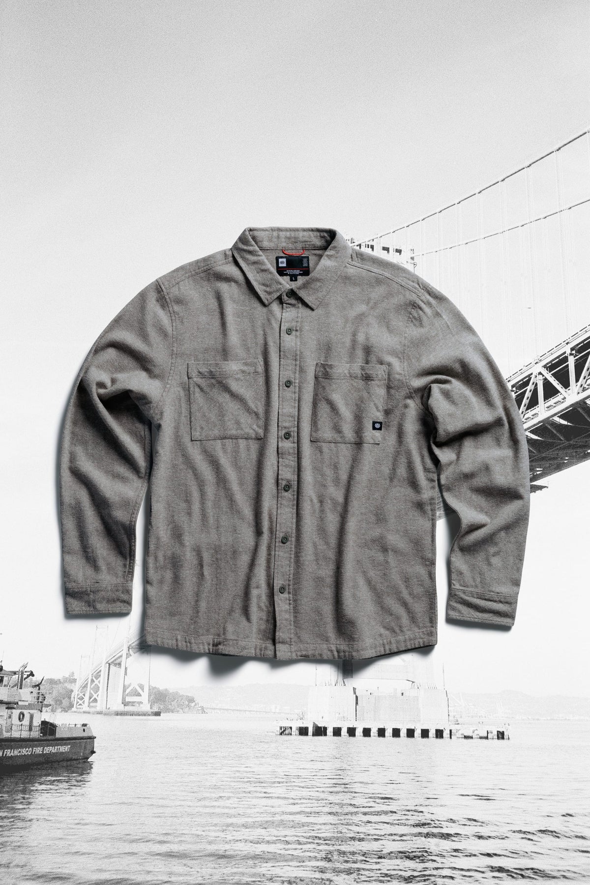 Gray midweight cotton button-down long-sleeve 686 Men’s SMARTY® Headwall Flannel shirt with two chest pockets.