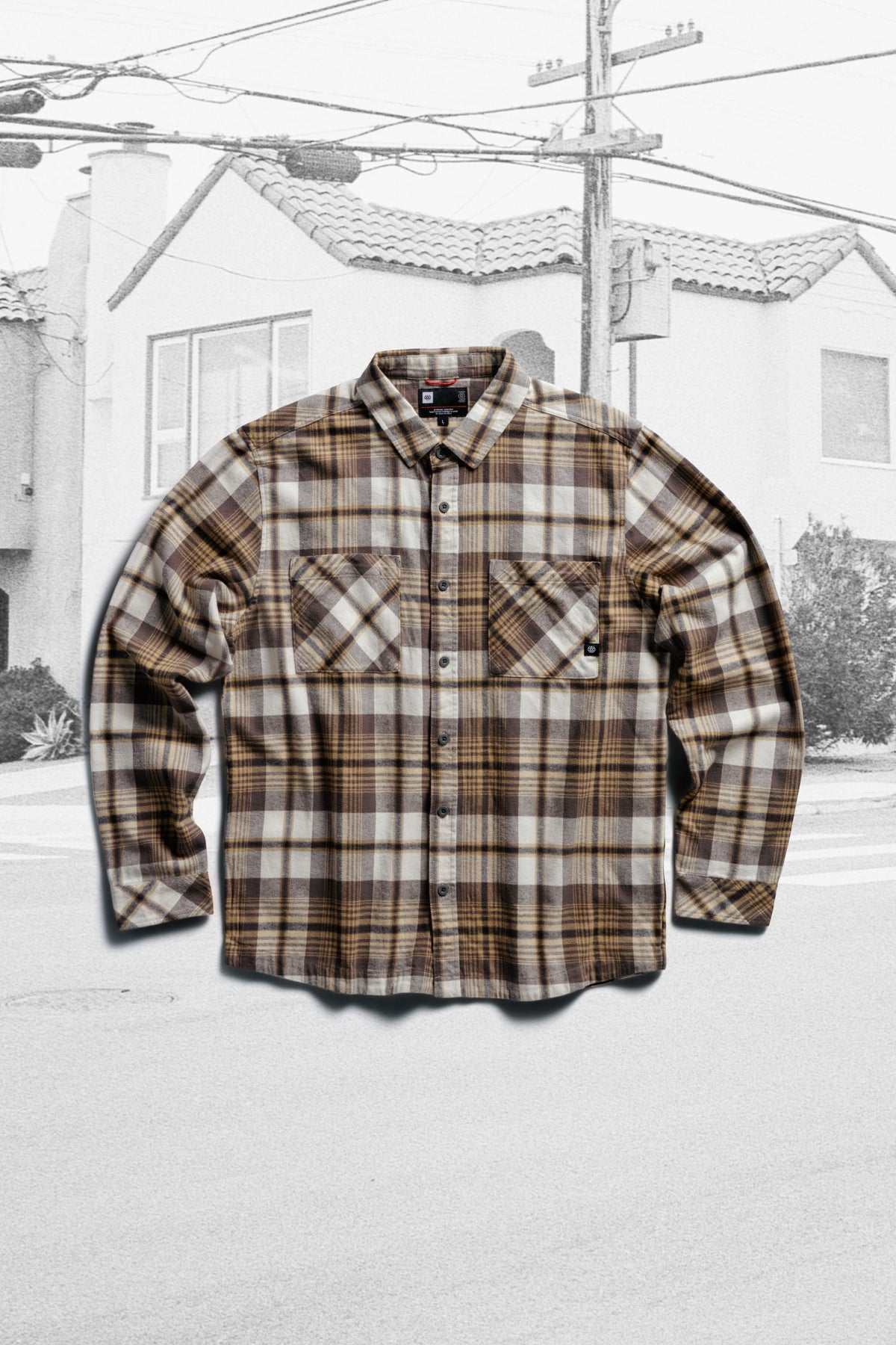 686 Men’s SMARTY® Headwall Flannel in a brown and tan plaid midweight cotton, featuring long sleeves, a button-down front, and two chest pockets.