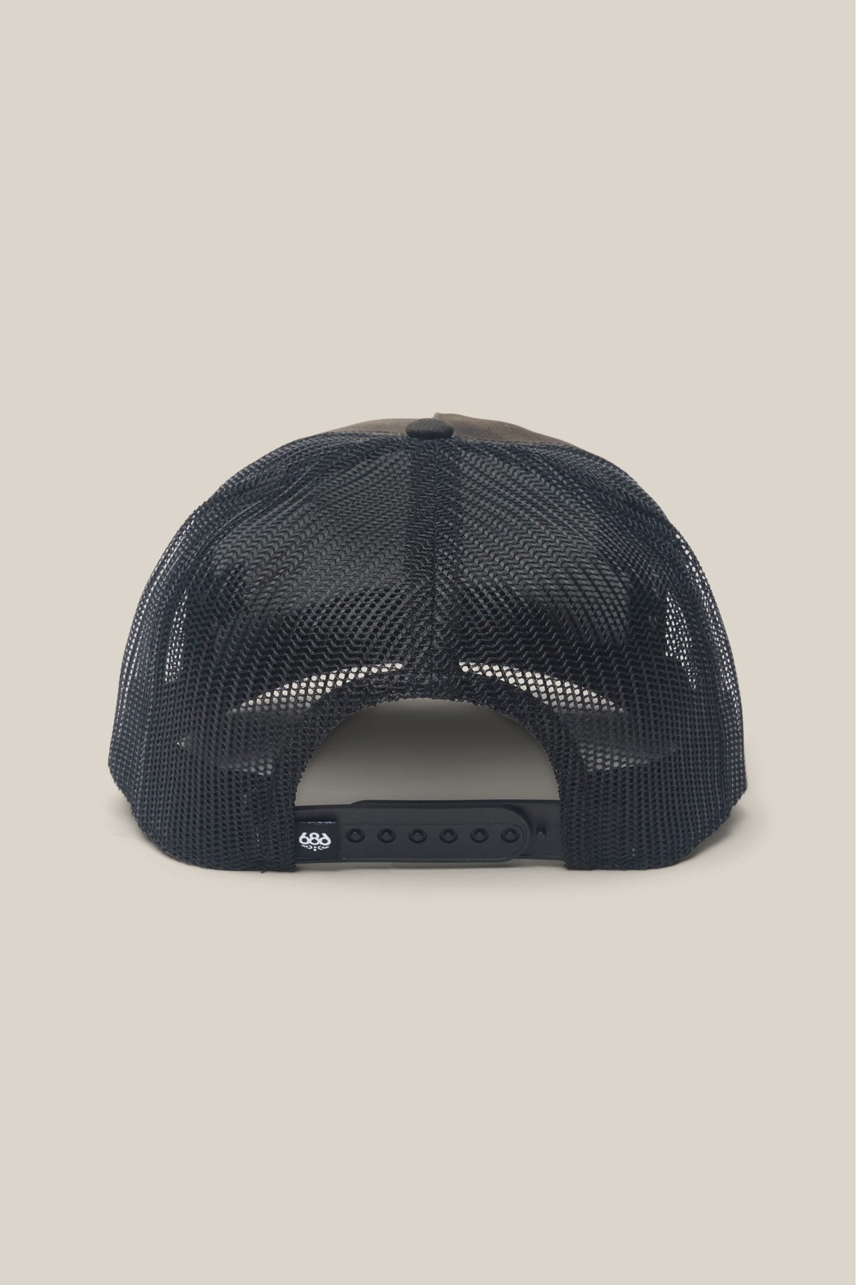 Back view of the 686 Mid Pro Metallica Unstructured Hat, featuring a mesh back and an adjustable plastic snapback closure.