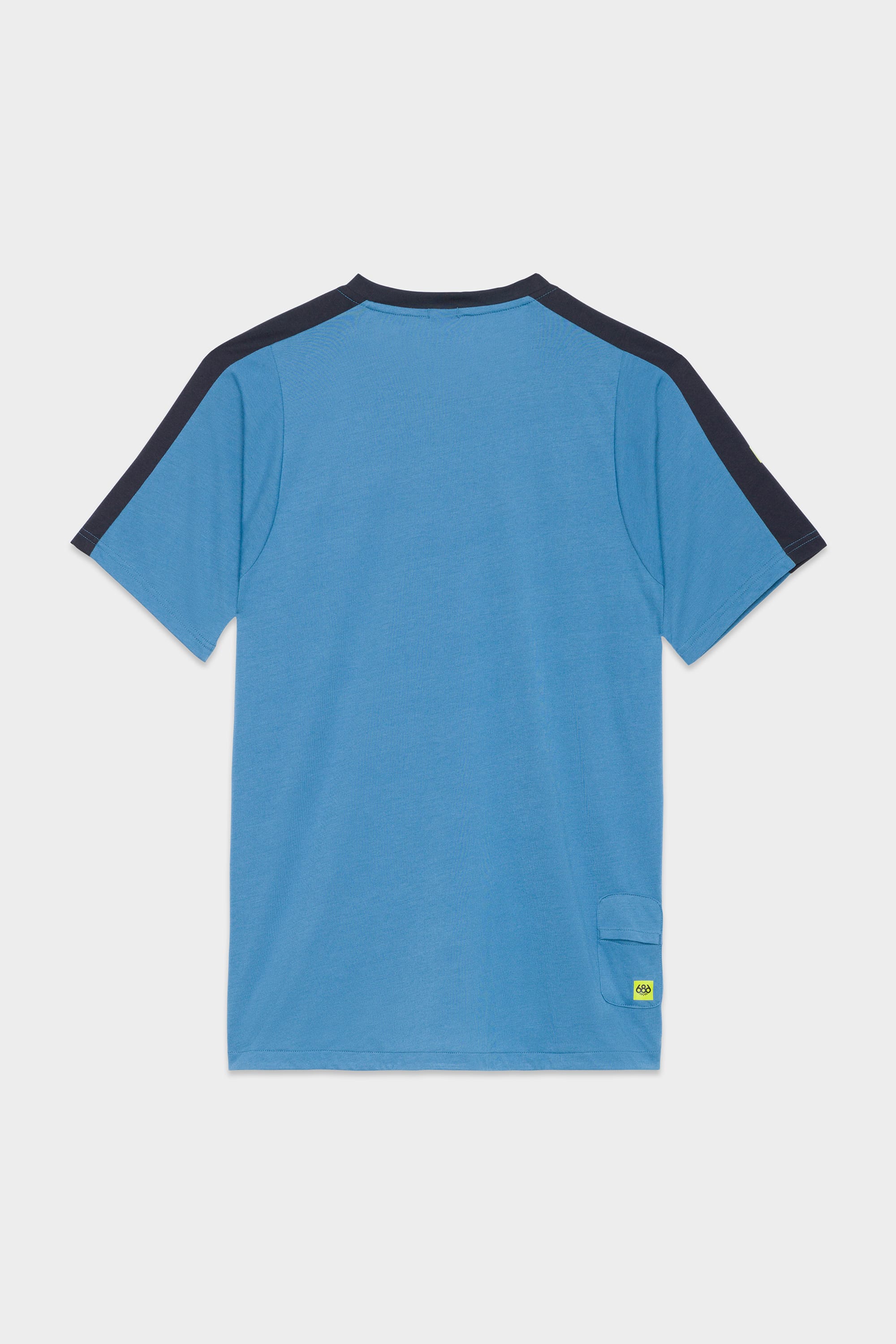 The 686 Mens Rival Short Sleeve Bike Jersey by 686 is blue with black shoulder panels, shown from the back. It features a small yellow tag on a pocket near the bottom right hem.