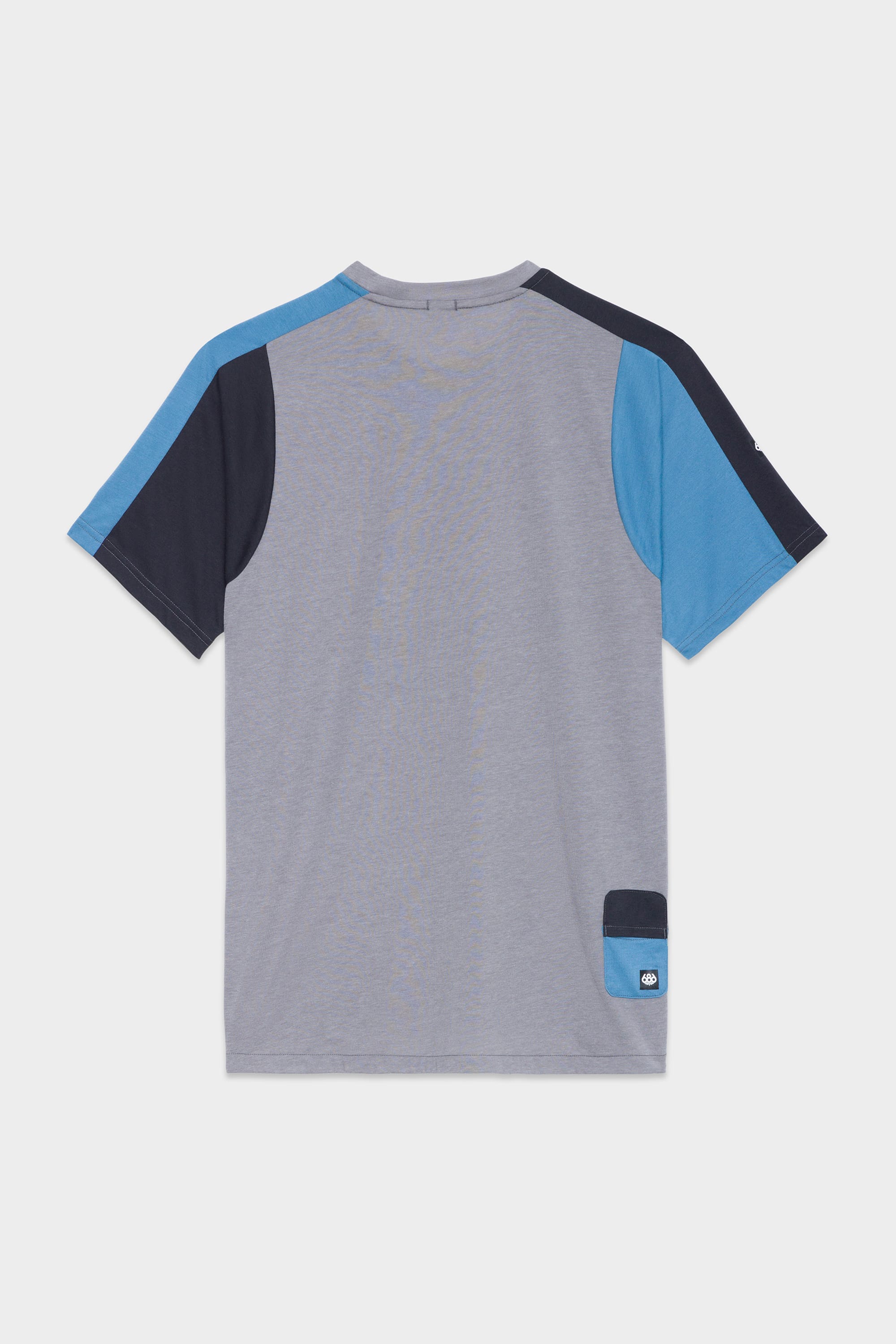 Back view of the 686 Mens Rival Short Sleeve Bike Jersey by 686, featuring a light gray body, blue right sleeve, dark navy left sleeve, and a small blue patch pocket with logo on the lower right side.
