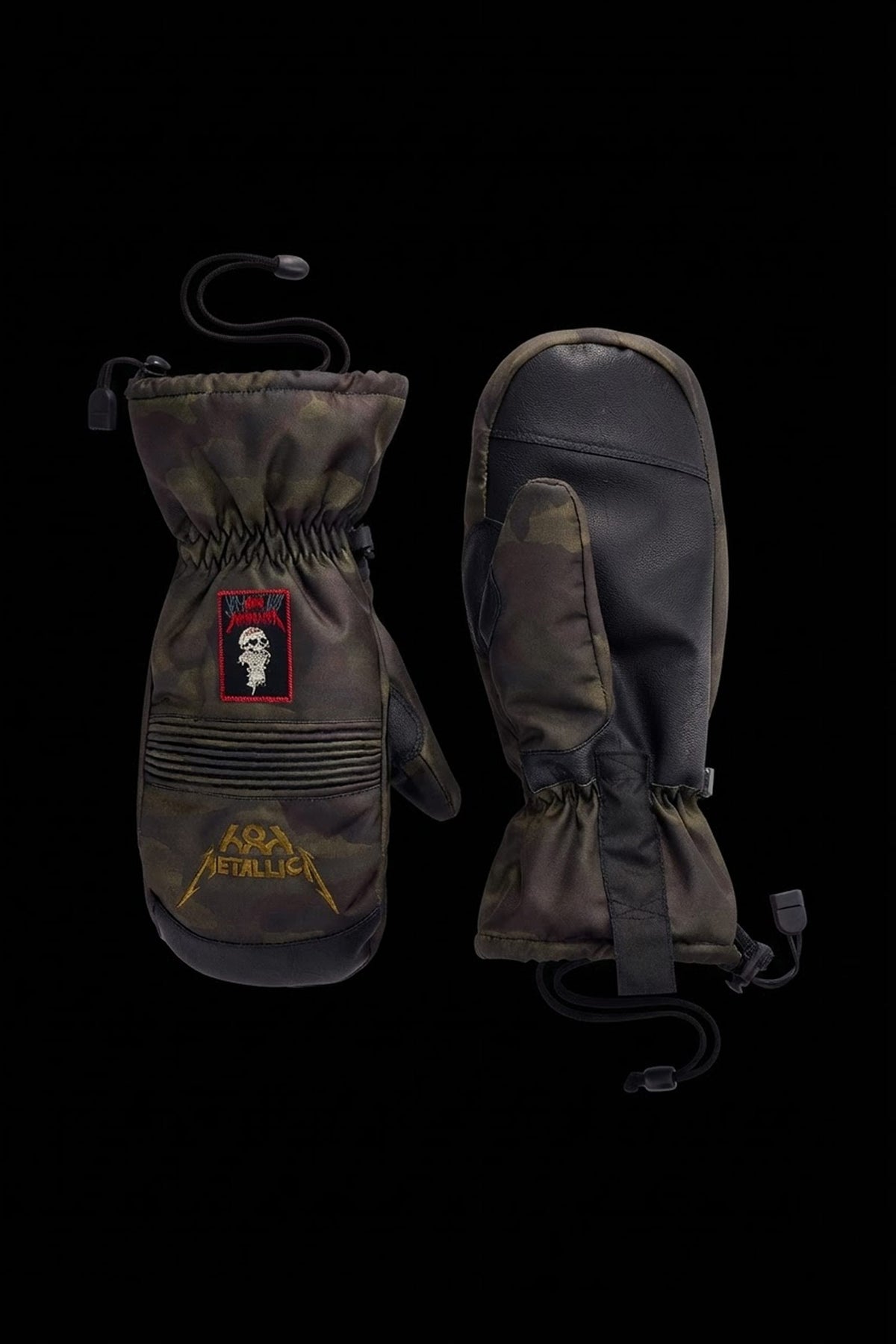 686 Men’s Lander™ Mitt featuring camouflage-print, a Metallica skull patch, and gold logo embroidery on the back of the hand.