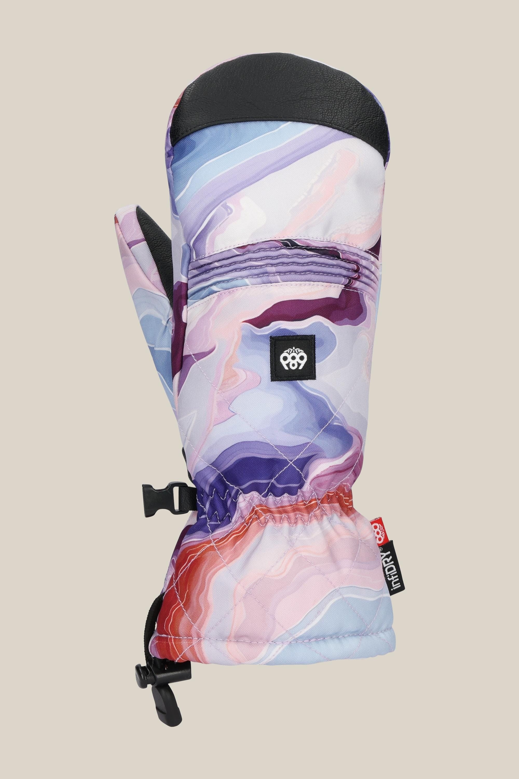 The 686 Women's Jubilee™ Mitt by 686 is a colorful winter mitten with light insulation, a marbled purple, pink, blue, and white pattern, black thumb tip, zipper pocket on the back, and a black logo patch above the elastic wrist.