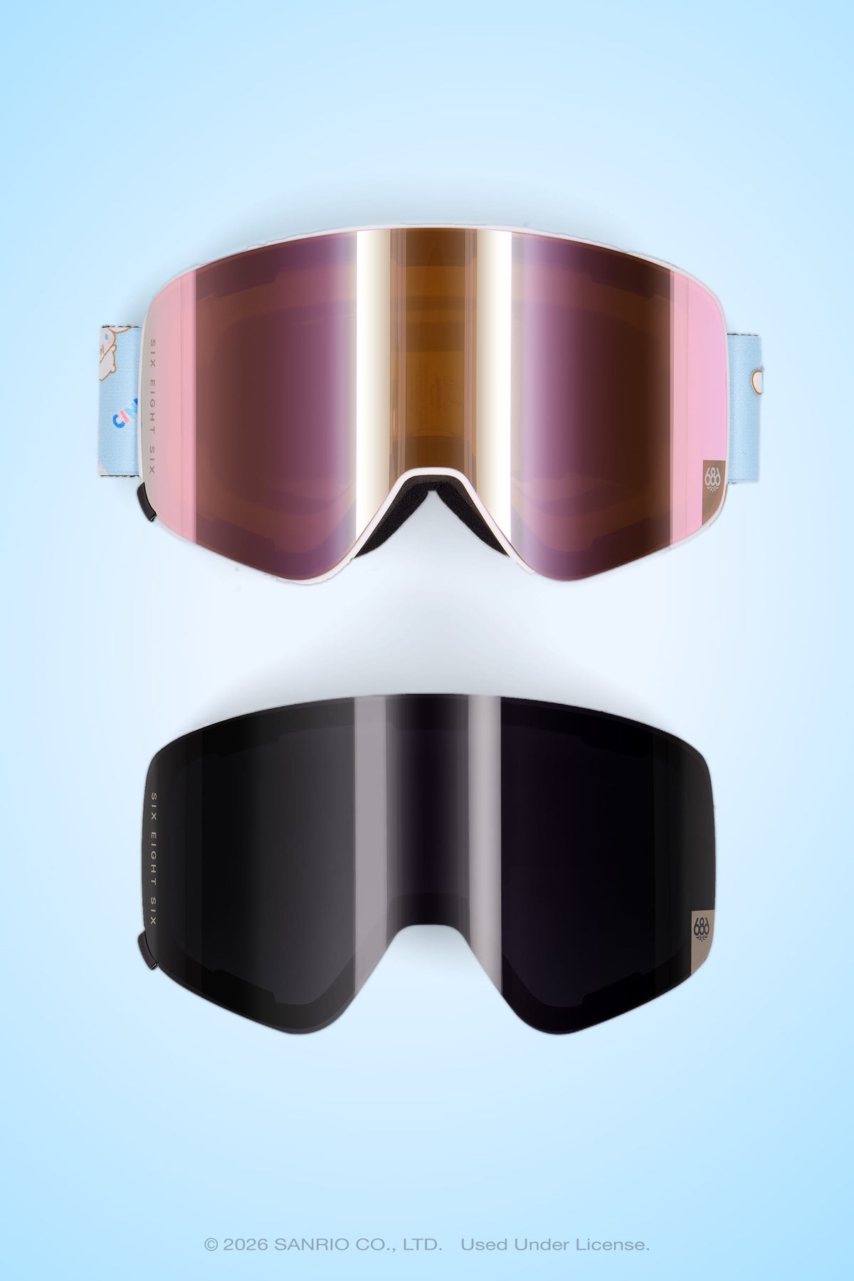 Two pairs of 686 SMARTY® Magnetic Goggles by 686, one with a pink-tinted reflective lens and the other with a black-tinted lens, are displayed on a light blue background. Both styles provide full-lens vision for an enhanced experience on the slopes.