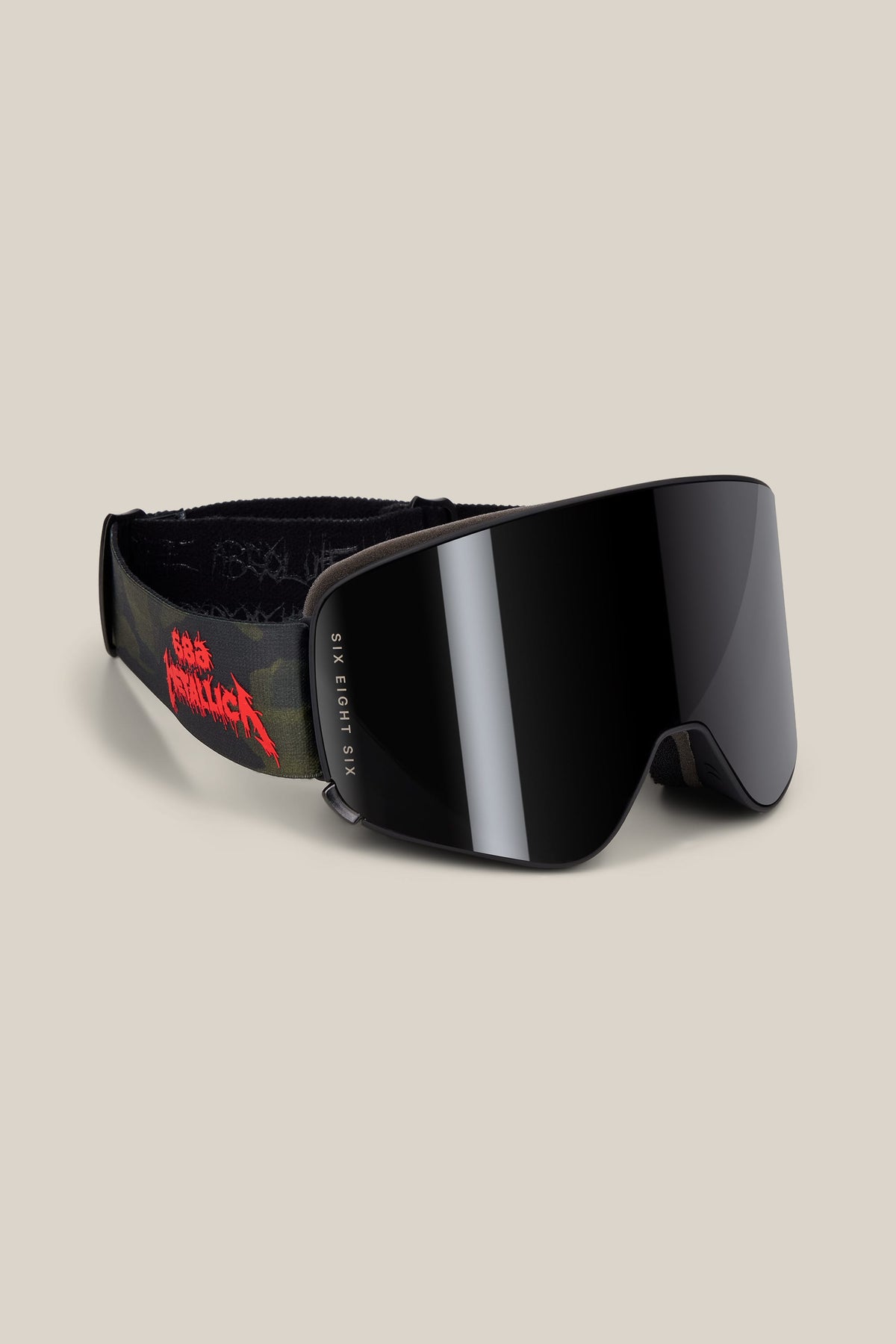 686 SMARTY® Magnetic Goggle with dark, reflective magnetic lenses and a camouflage-patterned strap featuring a red logo.