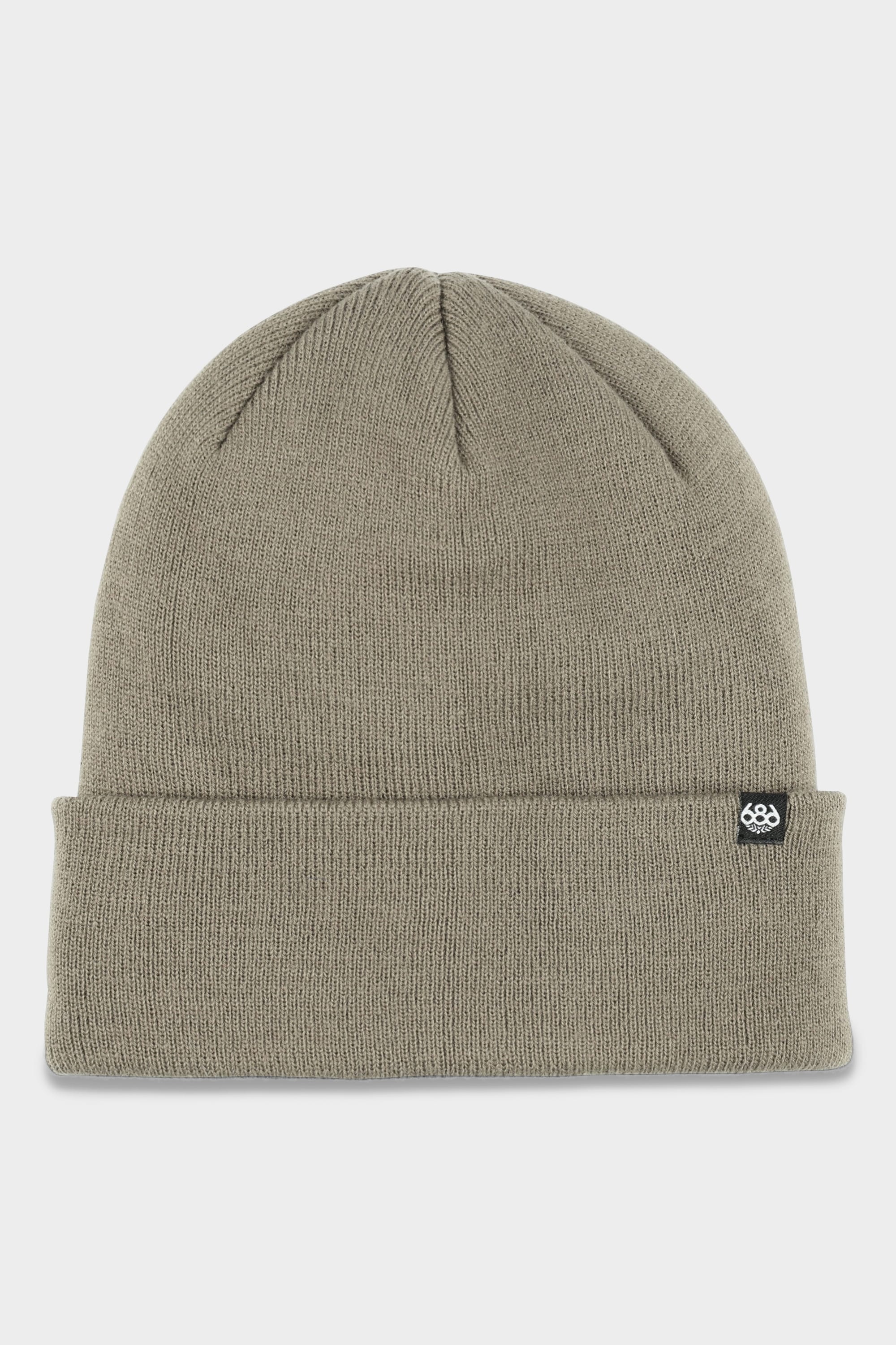 The 686 Standard Roll Up Beanie by 686 is a light gray knit hat with a folded brim and a small black rectangular tag featuring a white logo on the cuff, shown against a white background.