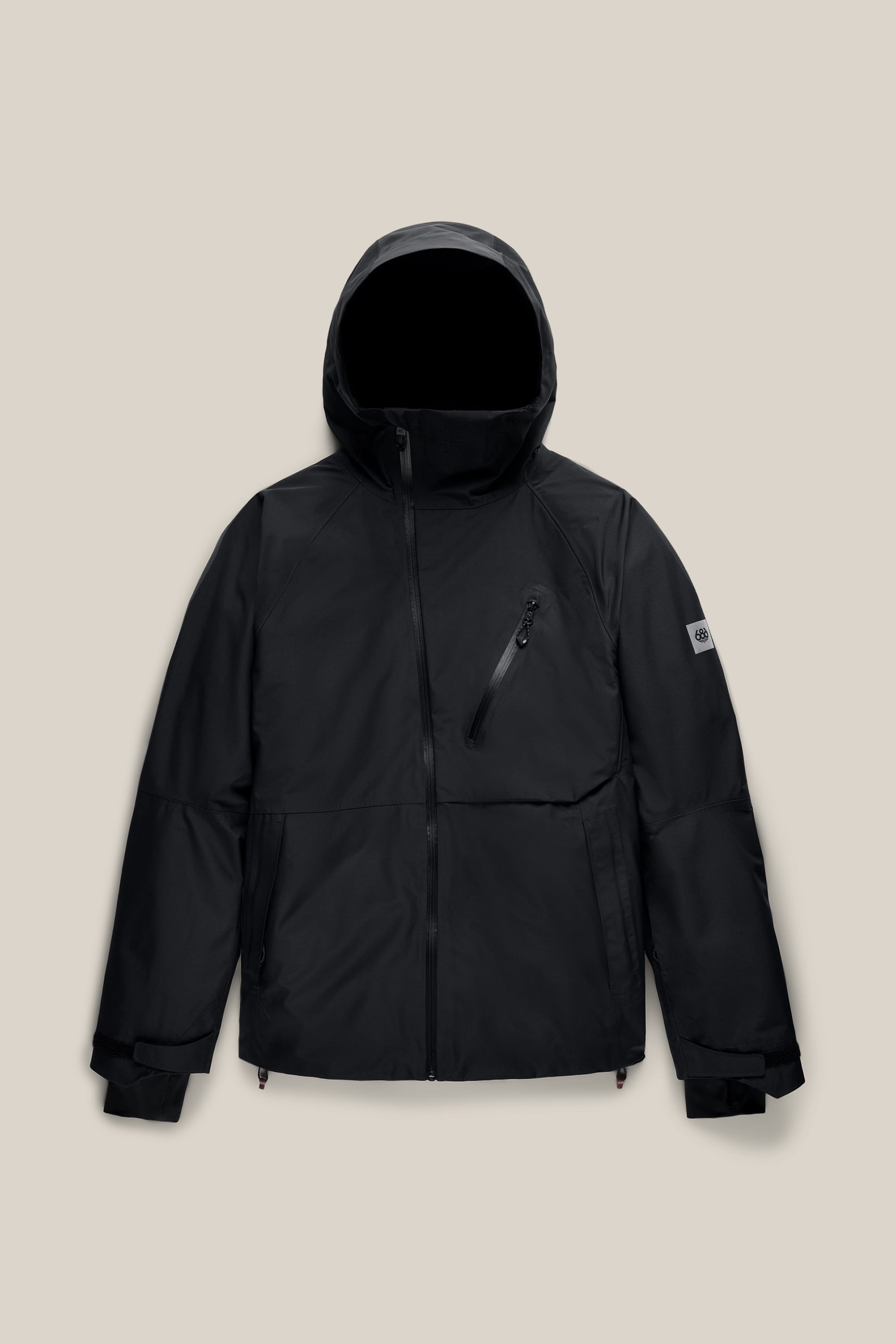 686 Men’s Hydra™ Thermagraph® Jacket by 686, featuring a black hooded design with a front zipper, zippered chest pocket, and adjustable cuffs, displayed on a light beige background.