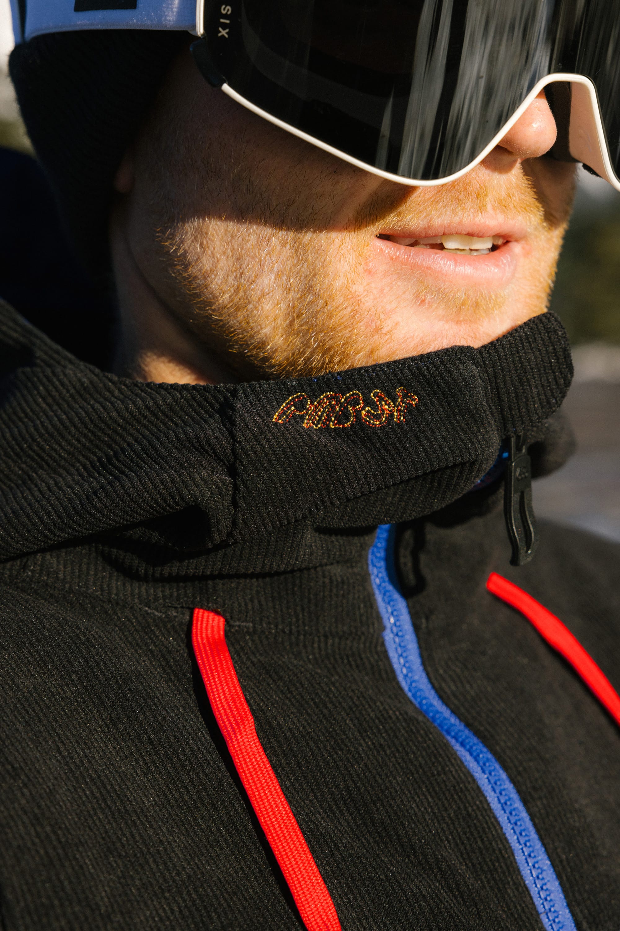 jacket with goggles on hood 686 Men's PBR Cooler Insulated Jacket PBR Blue / S