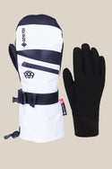 The image shows a 686 Women's GORE-TEX SMARTY® 3-In-1 Gauntlet Mitt in white, black, and grey with a Gore-Tex label, zipper, and wrist strap next to a plain black glove, both set against a simple background. Brand: 686.
