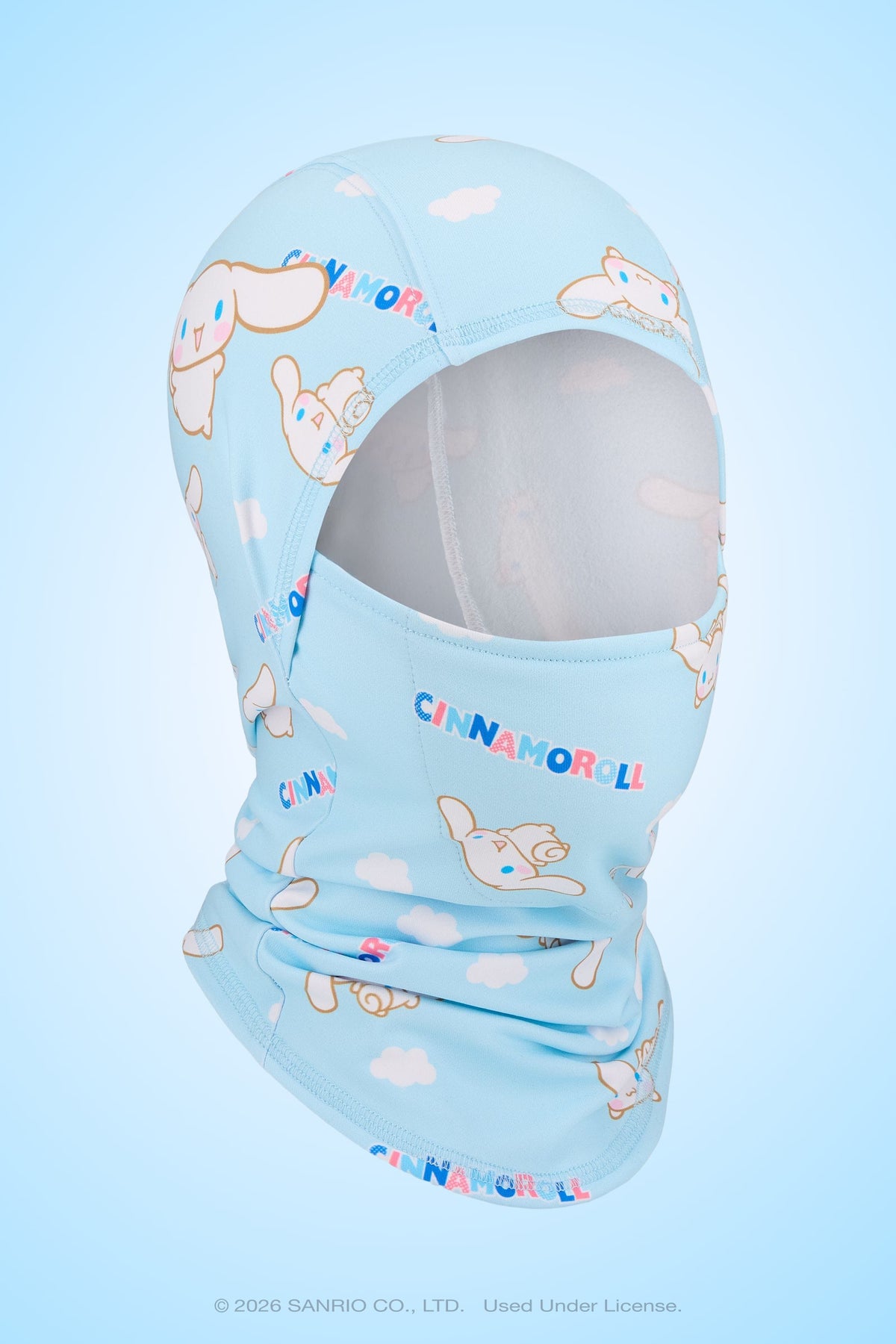 The 686 Hurra Hinged Balaclava by 686 features a light blue gradient background with Cinnamoroll cartoon characters, clouds, and the Cinnamoroll logo printed throughout.