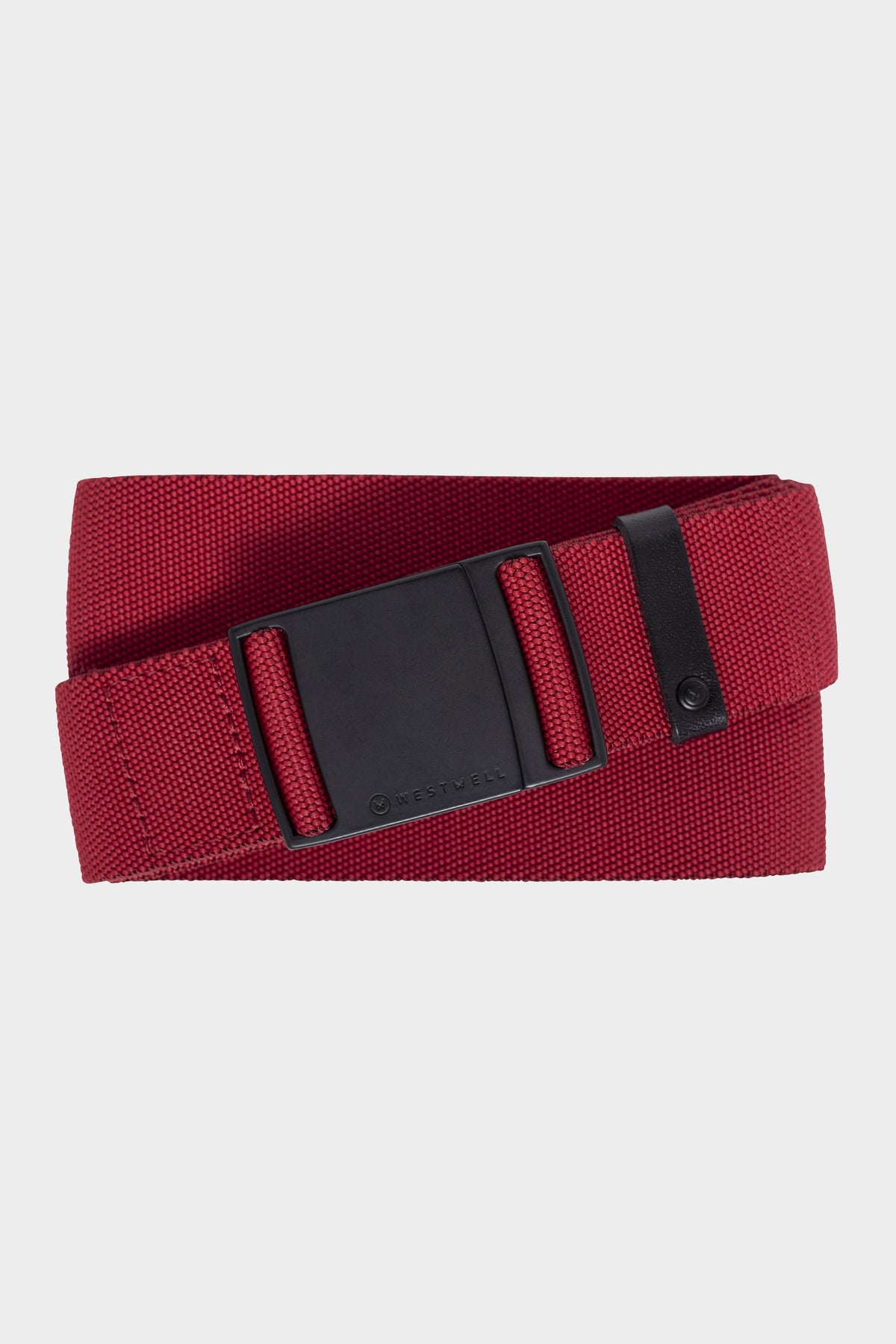 The 686 Westwell Clicker Stretch Belt by 686 is a red woven fabric belt featuring a black rectangular buckle, neatly rolled up on a plain white background.
